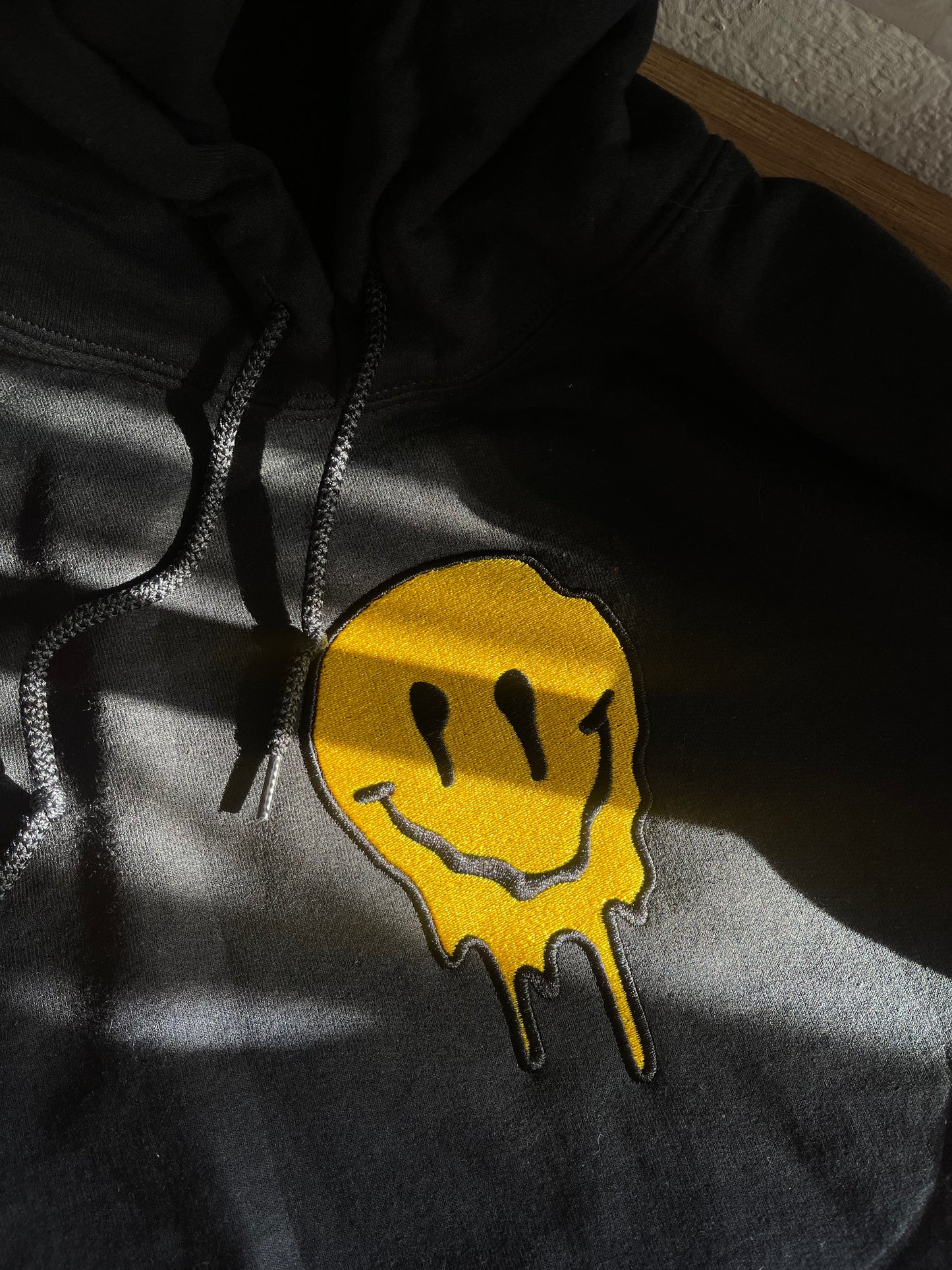 Droopy Smiley Face Hoodie Halaballoo